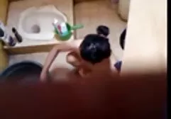 fucks herself with balls in the ass